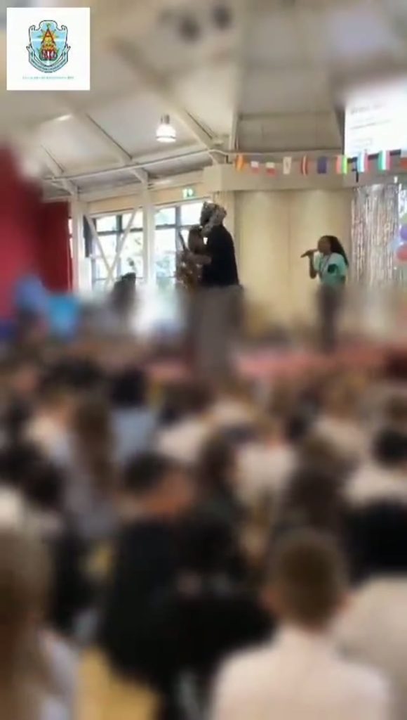 World in Colour: celebration in the school hall